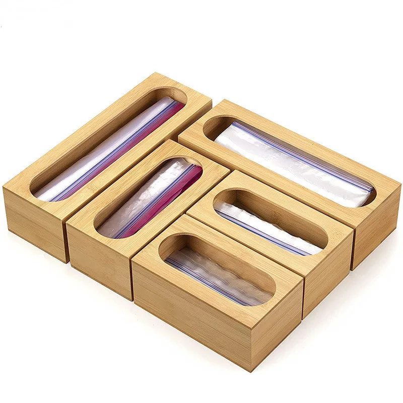 

5-in-1 Plastic Wrap Organizer with Cutter and Dispenser for Kitchen Storage - Holds Aluminum Foil Plastic Film and Plastic Bags