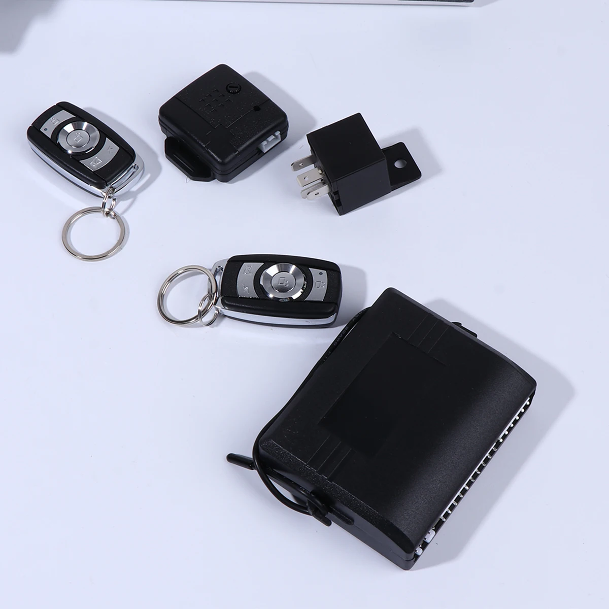 

12V Programmable Modes Auto Anti-Theft Vibration Vehicle Security Door Opening Detection Remote Control Car Security