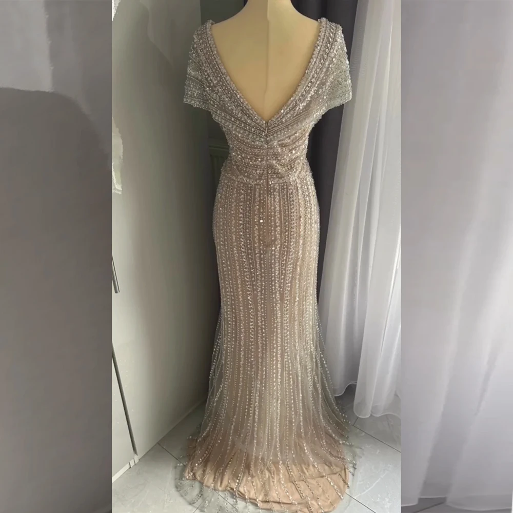 Luksusowa suknia wieczorowa Dubai Mermaid V Neck dla kobiet 2024 Eleganckie koraliki Arabskie długie formalne suknie ślubne na studniówkę Dostosowane