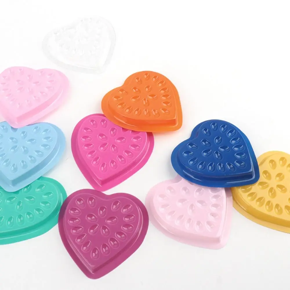 100PCS supporto per colla per ciglia adesivo colorato in PVC a forma di cuore cuscinetti per supporto adesivo per ciglia fiore colla per ciglia Pallet