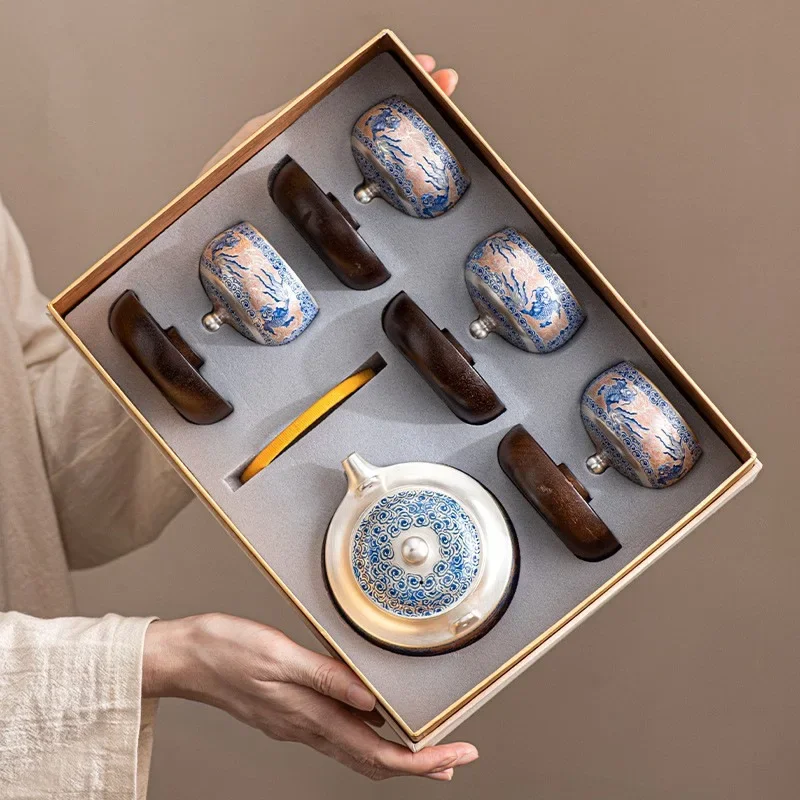 Luxury Tea Set Gilt Silver Teapot Anti-scalding Handlebar Kettle Tea Drinking Cup Rotating Master Cup One Pot Four Cups Tea Set