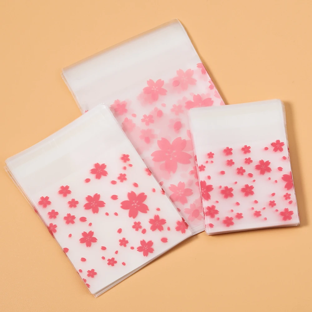 

100pcs Plastic Packing Bags Flower Self-Adhesive Bags OPP Pouches for Jewelry Gifts Biscuits Candy Cookies Packaging