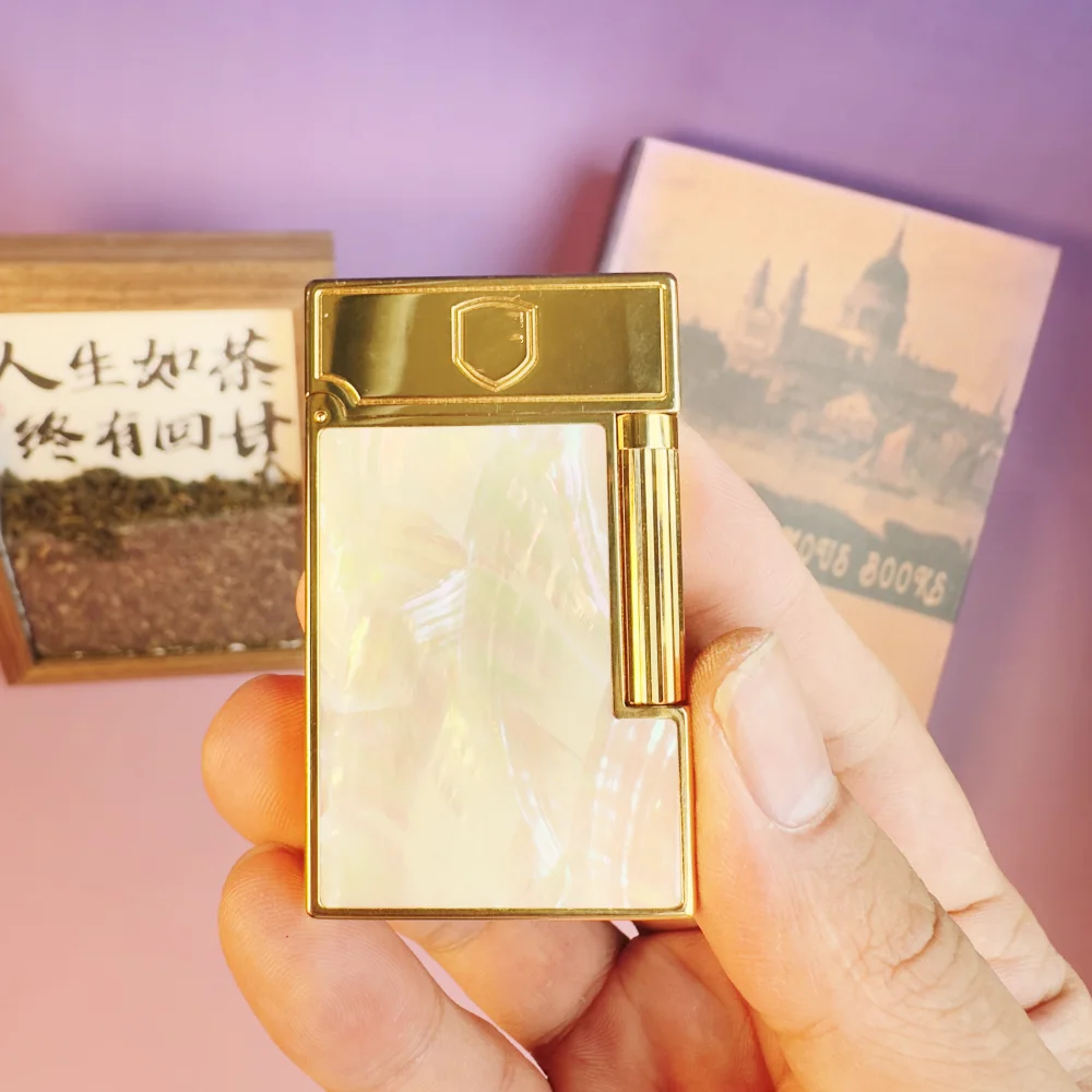 

Branded lighters and cigarette accessories, made from natural seashell material, and including a set of custom accessories.