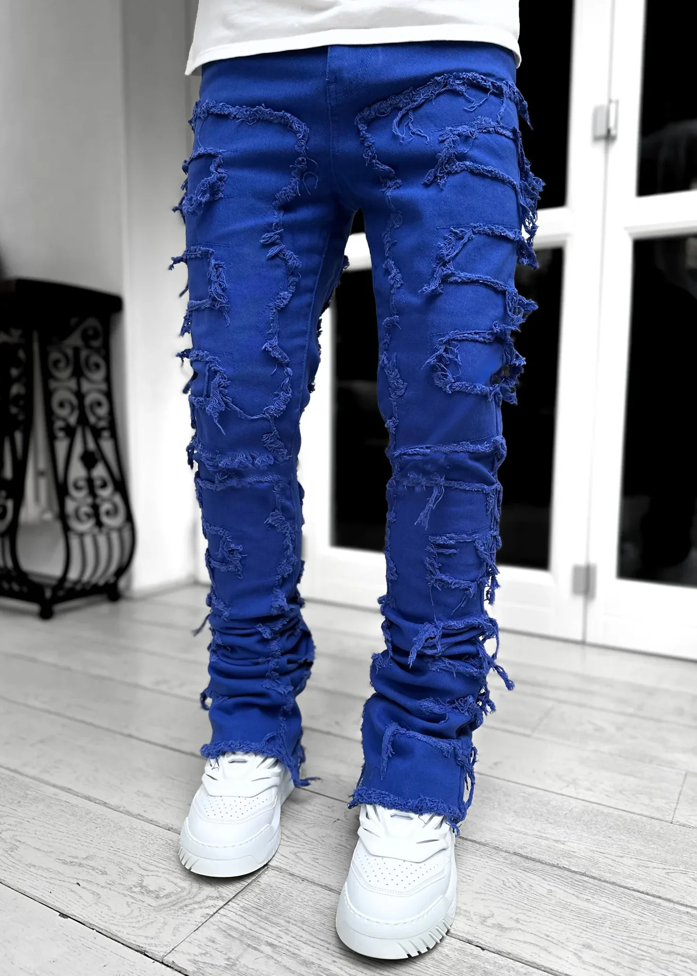 Jeans impilati Regular Fit da uomo strappati Slim Fit Patch Distressed pantaloni dritti in Denim distrutti Hip Hop Streetwear panno per pantaloni