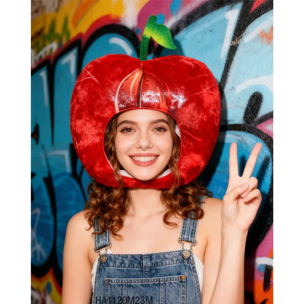 

PESENAR This is a red apple shaped wacky headgear with green fruit stalk blades and a round opening on the front for parties