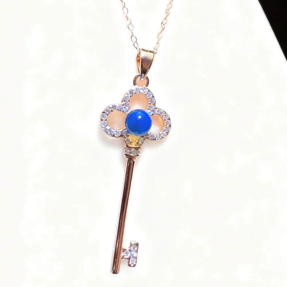 

Pure Silver Setting Natural Dominican Blue Amber Pendant 4mm Round Bead Hollow Key Design