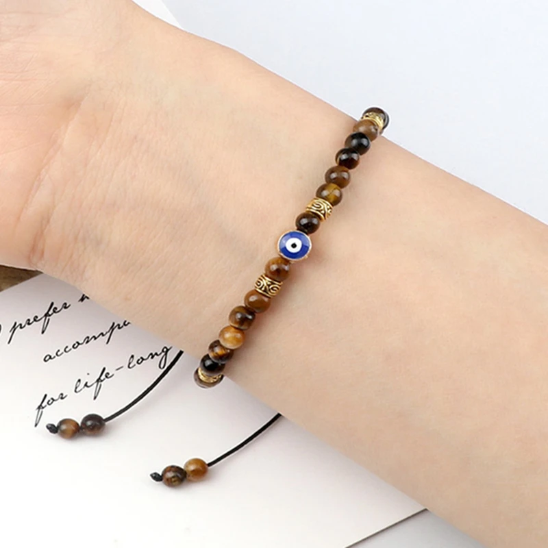 Czarna kamień lawowy bransoletka Evil Eye dla mężczyzn damska pleciona regulowana koraliki w kolorze Tiger Eye bransoletka Yogo moda biżuteria