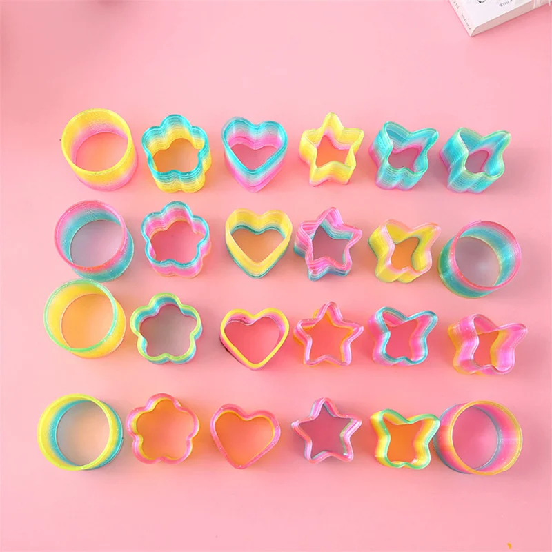 

24Pcs Color Polygon Rainbow Neon Magic Spring Toys Kids Birthday Gifts Wedding Guest Party Favors Finger Game Christmas Pinata