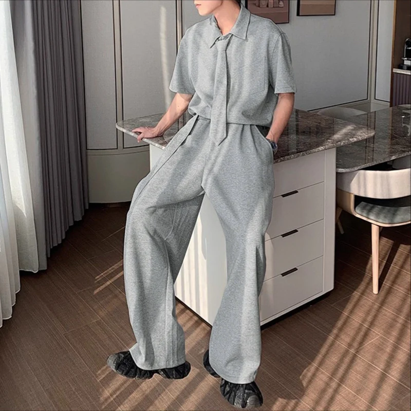 

INCERUN Мужские комплекты Однотонная рубашка с короткими рукавами и брюки с лацканами Комплекты из двух предметов Свободная уличная одежда 2025 Модные повседневные мужские костюмы