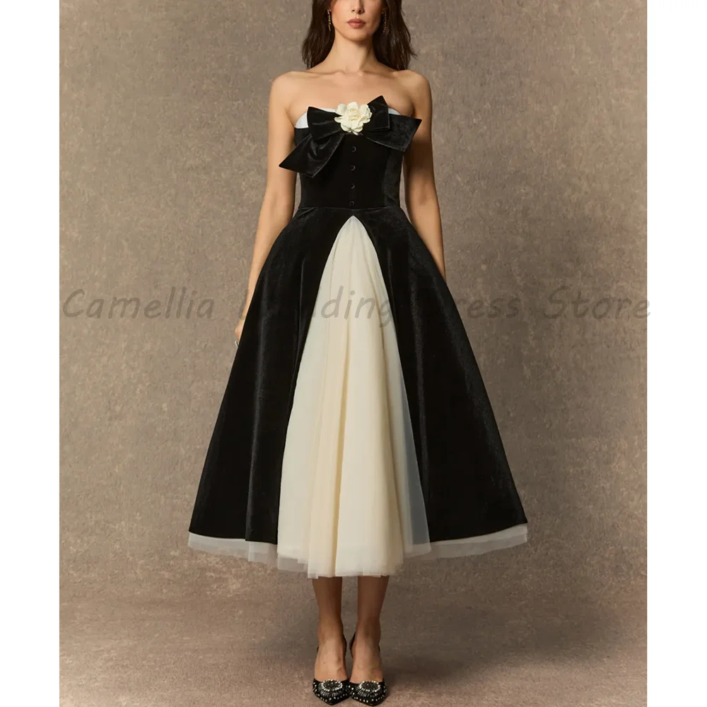 

Black Ivory Strapless Velvet Midi Dress with Bow Camellia Applique Corset Bodice Tulle Skirt Formal Evening Cocktail Party Gown