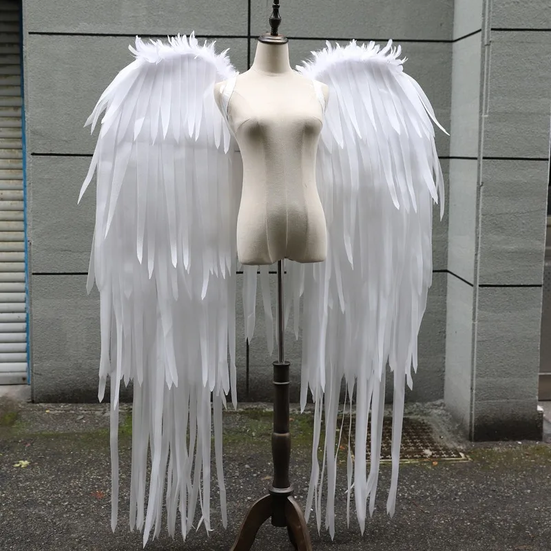 White oversized simulated feathered angel wings
