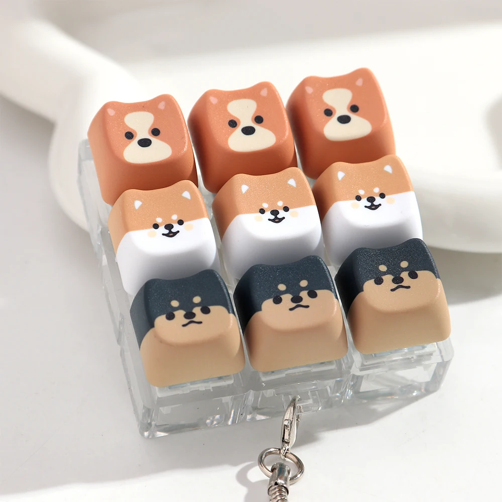 Neue 9-Tasten-Hunde-Finger-Tastatur ohne Beleuchtung, Stressabbau-Fidget-Schlüsselanhänger, Zeitvertreib-Tastenknopf, Quetschspielzeug für Erwachsene – Detail 6