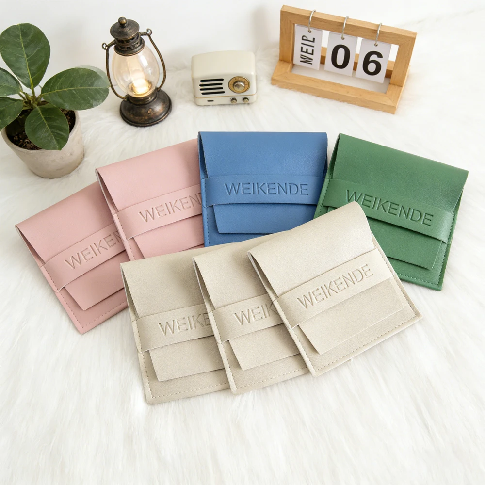 

100 шт., цветной кожаный логотип, роскошные сумки, упаковка для ювелирных изделий, серьги для духов, ожерелье, кольца, губная помада, органайзер с клапаном из искусственной кожи