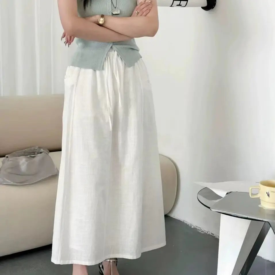 

2026 pure cotton half skirt summer versatile elastic waist drawstring slimming white A-line skirt