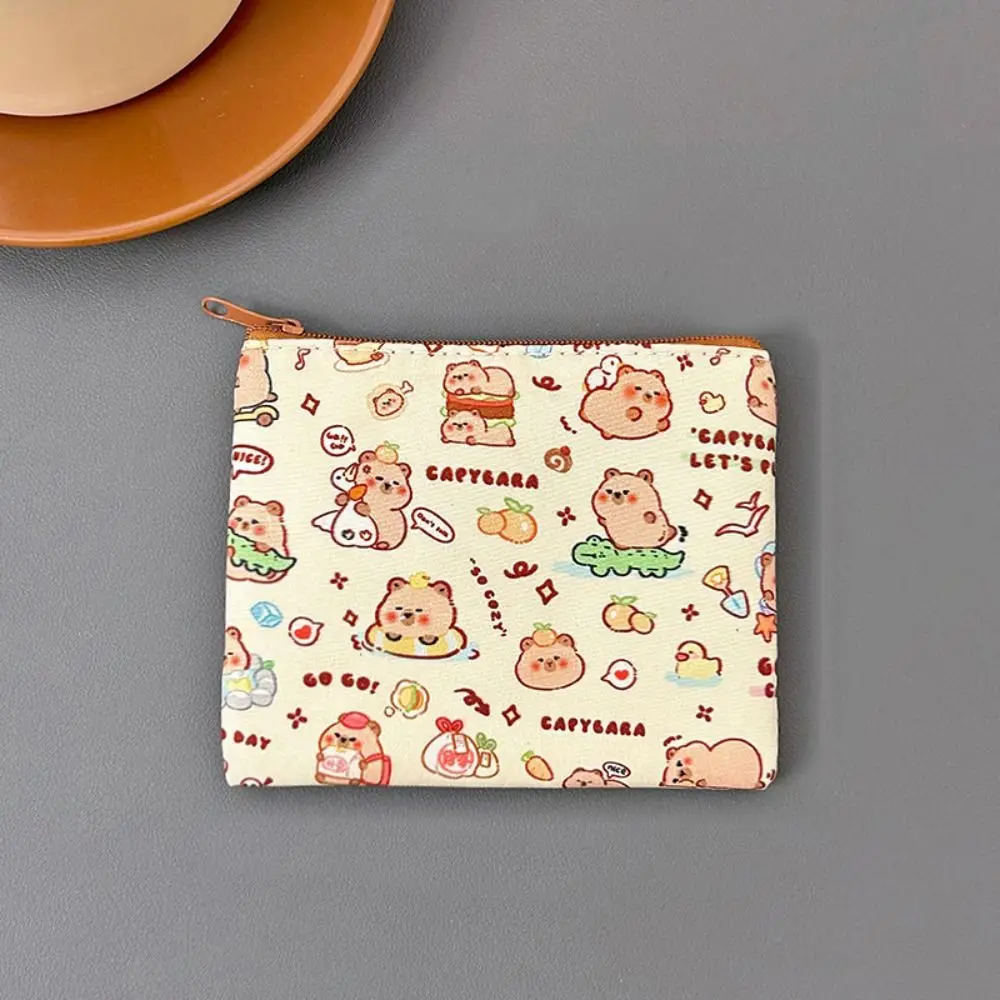 Capybara monedero con cremallera, monedero de lona, funda protectora para auriculares, estuche de viaje