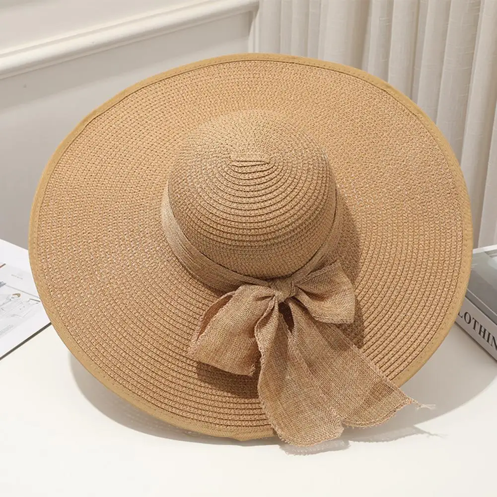 Women Fisherman Hat Bow-knot Decor Solid Color Wide Brim Decorative Sunscreen Foldable Strap Women Beach Straw Hat Headwear 썬캡