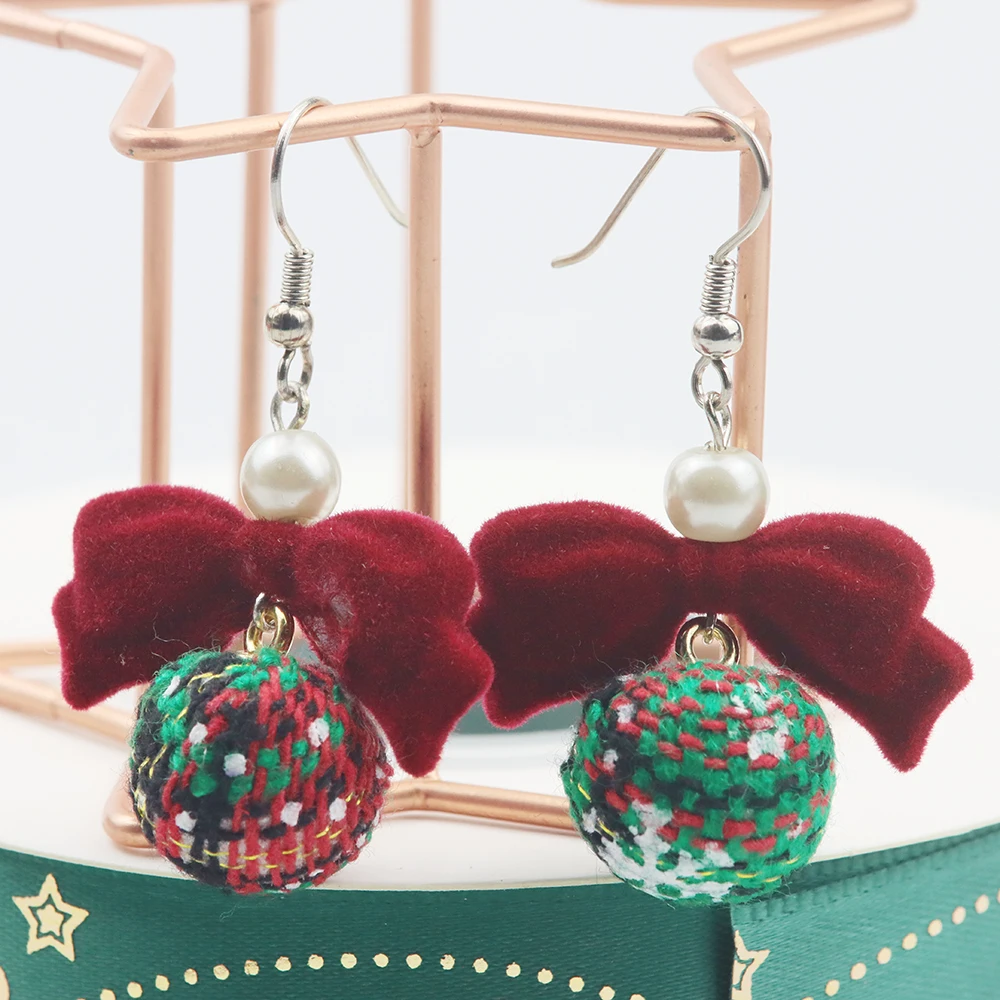 A pair of Christmas romantic bow earrings winter plaid pendant earrings Girl Christmas party party gift