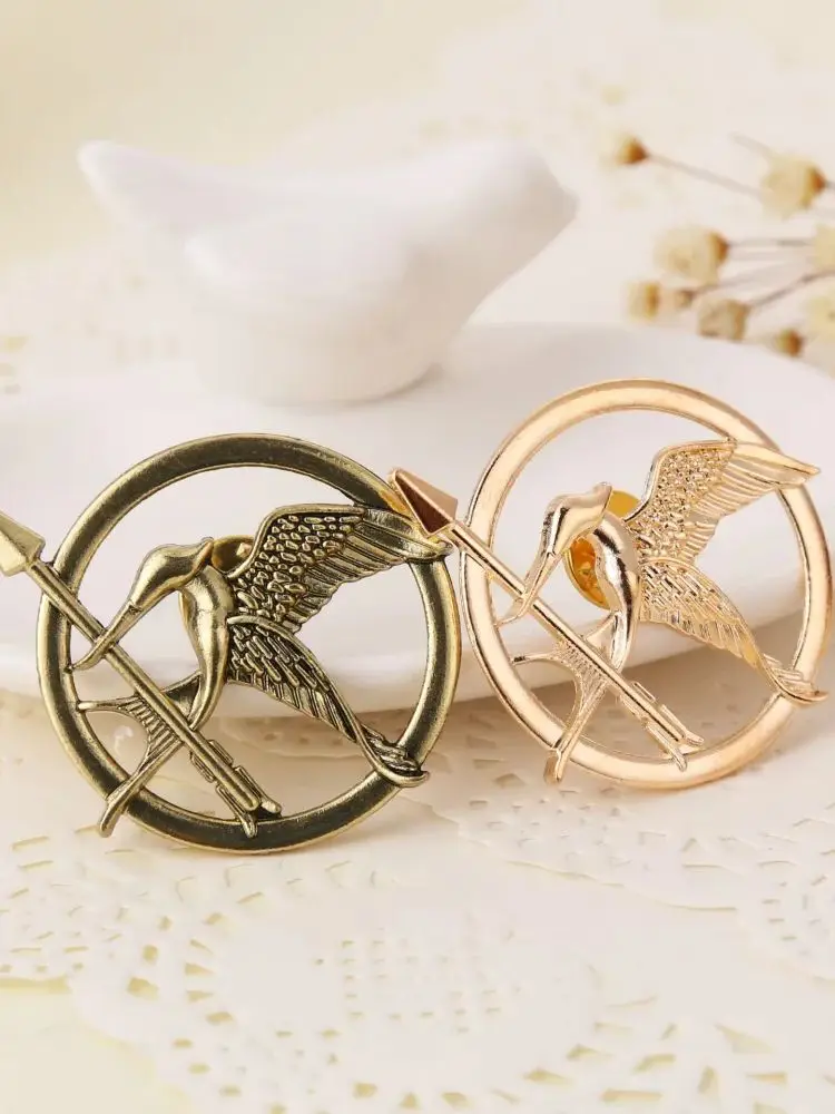 Mode trendiger Schmuck The Hunger Games Beliebte Vintage-Stil Vögel Broschen Filme Schmuck Cosplay Geschenke