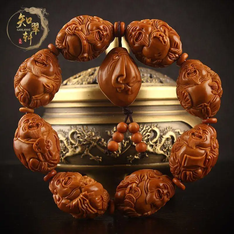 

Olive Nut Carved Eight Mammon Bracelet Men and Women Hand Toy Olive Nut Large Seeds Chicken Blood Core Laughing God of Wealth Ha