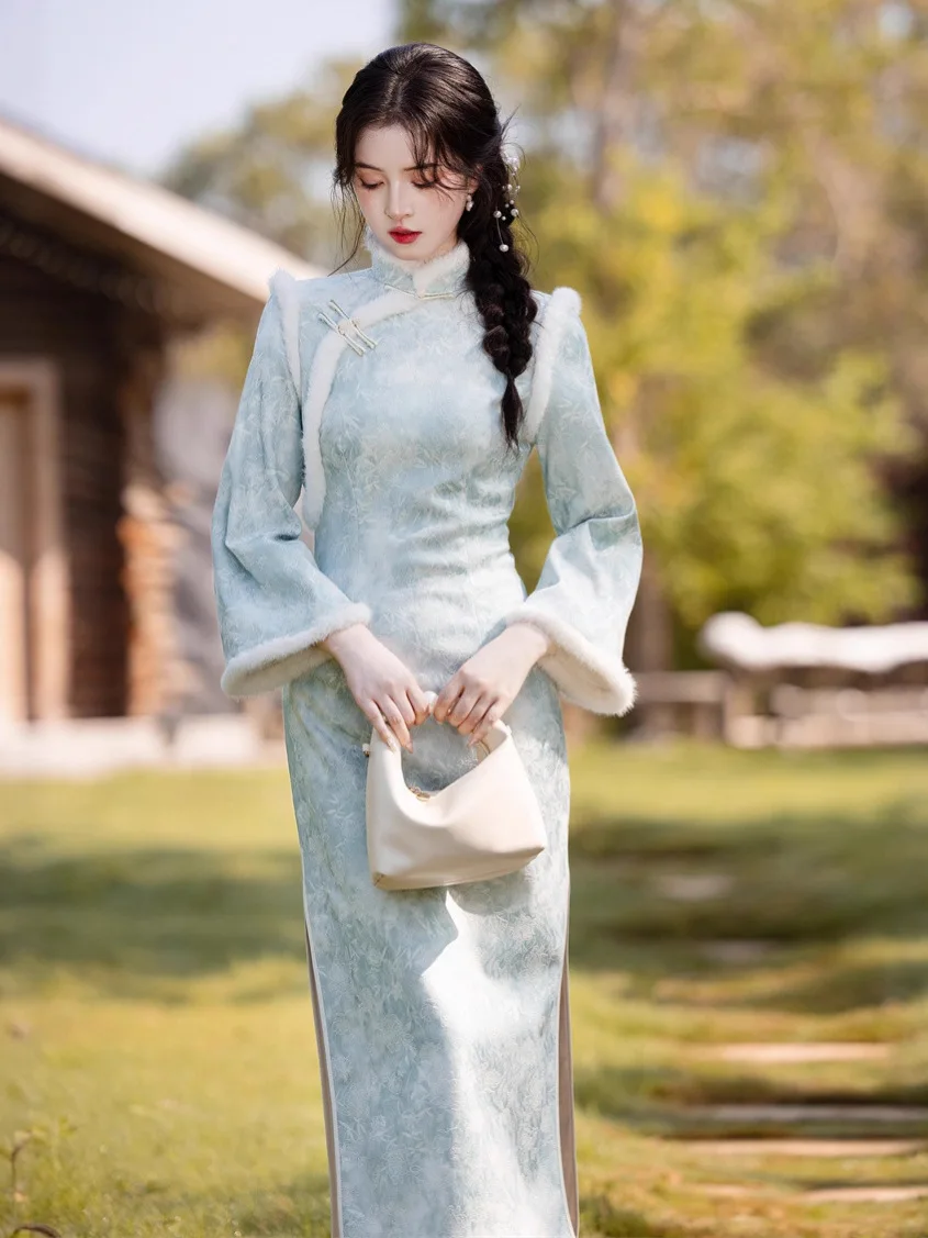 شيونغسام طويل سميك جديد لشتاء 2025 بأكمام كبيرة مقلوبة وياقة واقفة بقصة ضيقة من تشيباو