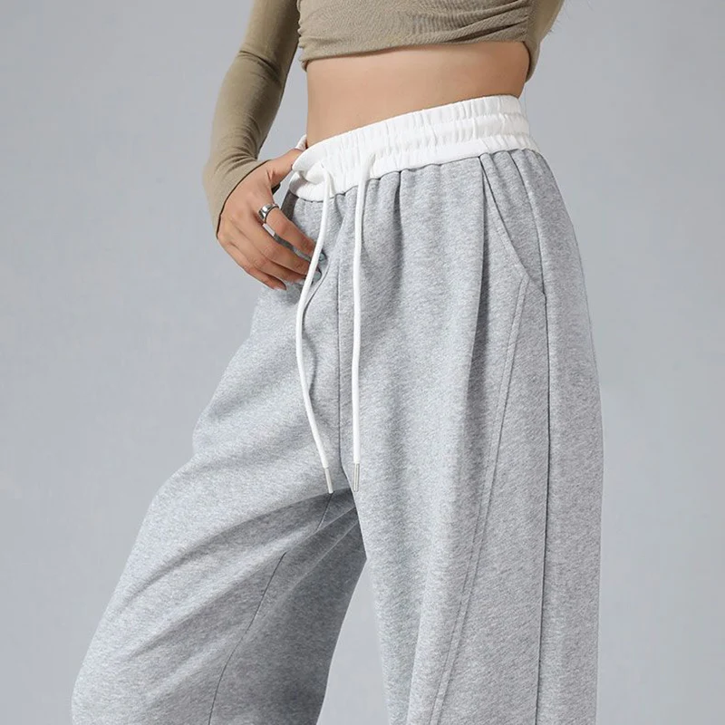 الفتيات الكلاسيكية مصمم واسعة الساق Sweatpants 2025 رائجة البيع الإناث عالية الخصر السراويل النساء الكورية فضفاض الرباط السراويل