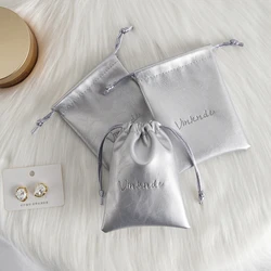 50Pcs Custom Logo Embossed Silver PU Leather Jewelry Bag Ring Earring Bracelet Drawstring Storage Pouch Makeup Travel Dust Sack