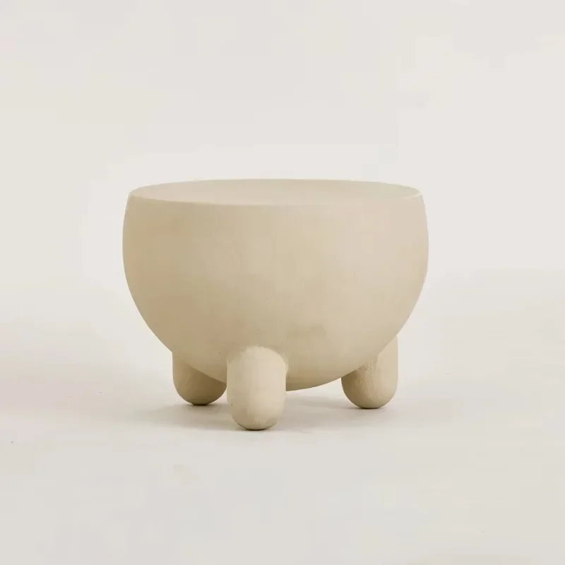 

Milky white round bedside table with legs made of fiber-reinforced plastic coffee table