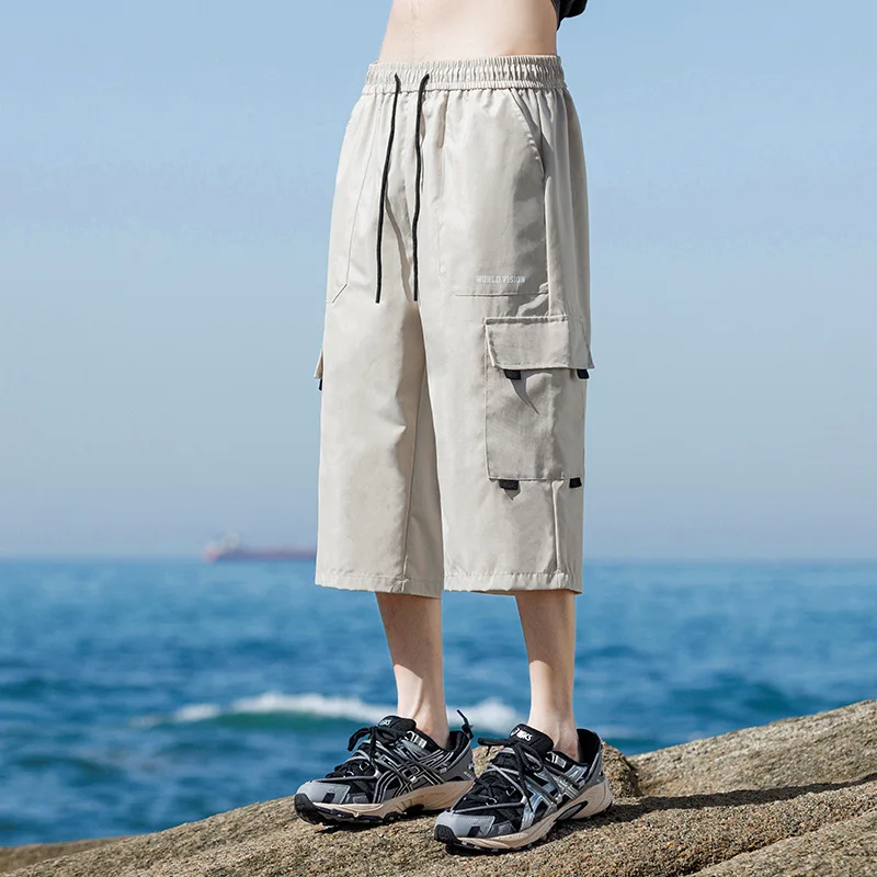 السراويل الرياضية 3/4 السراويل رجل الصيف حجم كبير الرجال الصيف اقتصاص السراويل الرجال ملابس خارجية سوداء فضفاضة العصرية رقيقة نمط الرجال الذكور