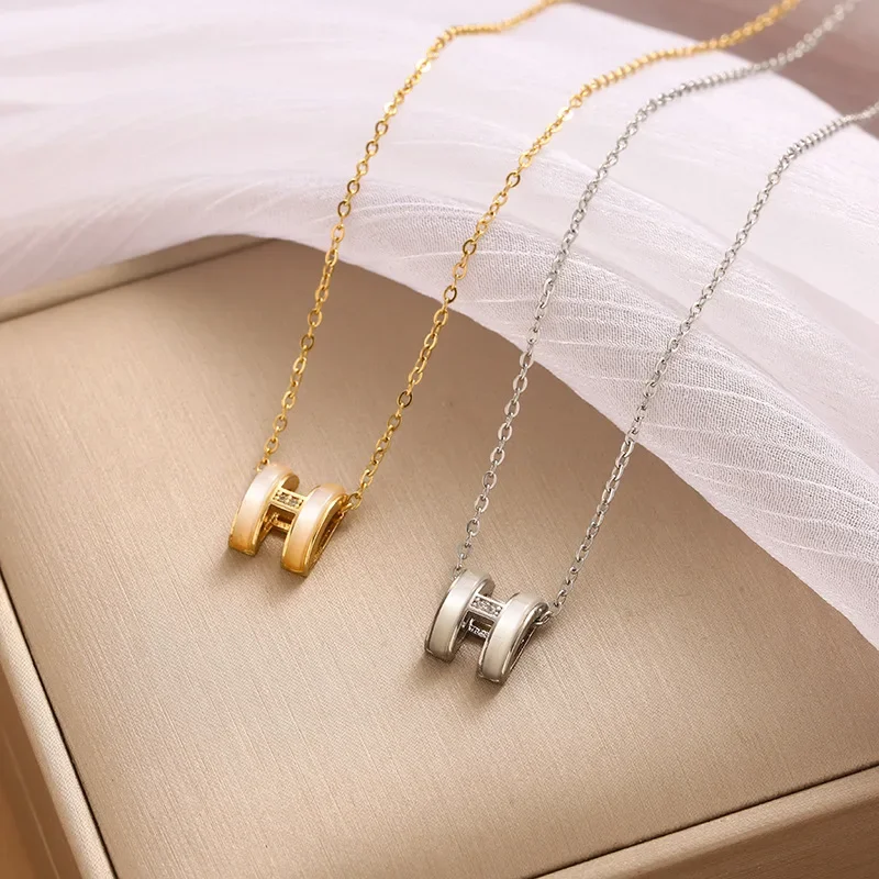 

Fashionable clothing necklace, retro necklace, cat's eye H-shaped diamond pendant titanium steel women's necklace