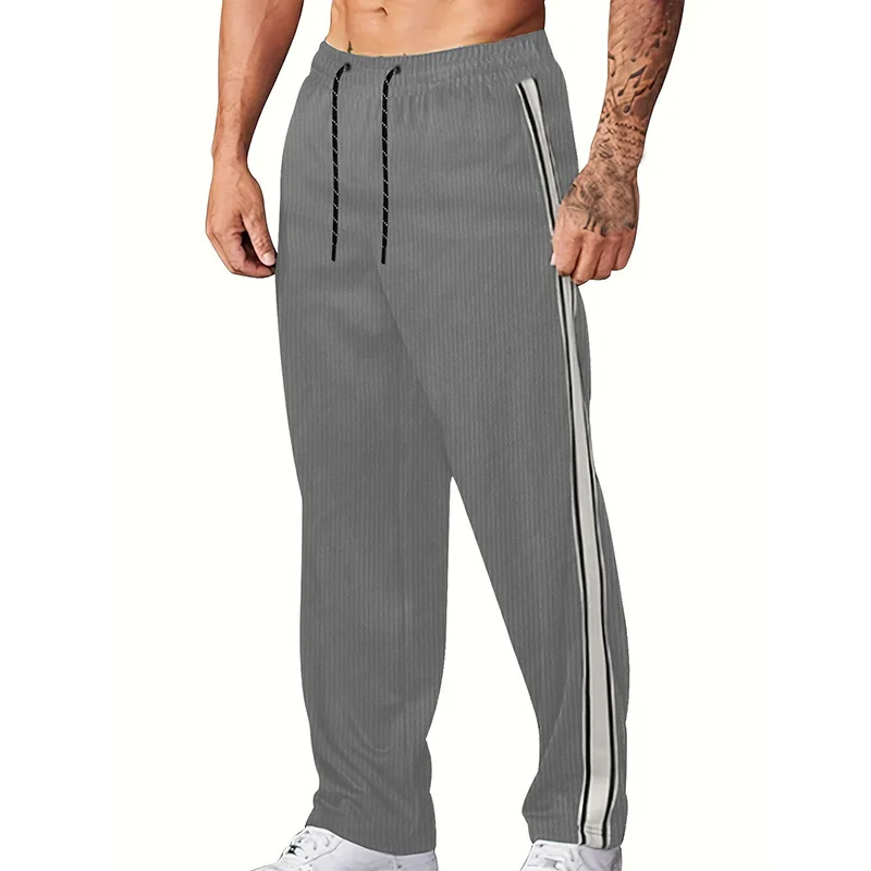 New casual corduroy striped sports pants in 2025. Loose, stylish and casual. Men's long sports pants.  roupa de academia