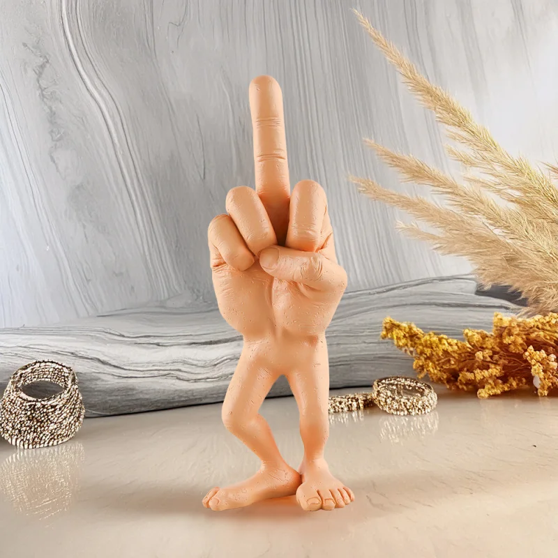 

Resin figurine of a legged middle finger as a quirky decoration for the living room, office desk or gift