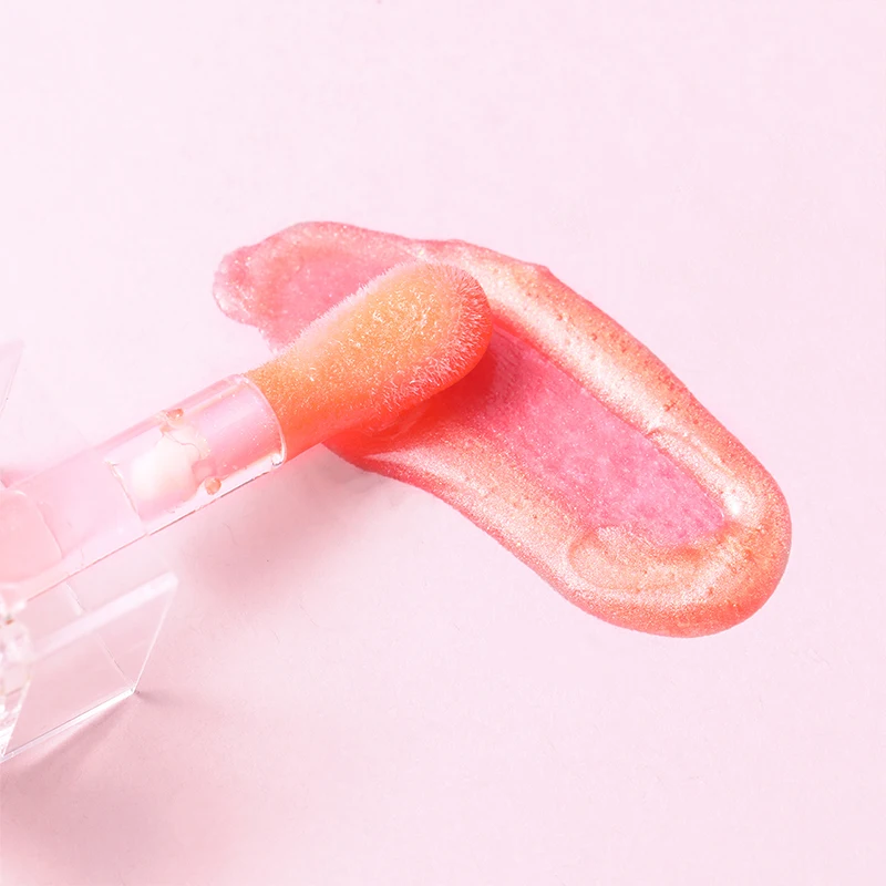 Orangerot feuchtigkeitsspendender Lipgloss, glänzender öliger Lipgloss, natürliches Lippenaufhellungsprodukt, zur Verschönerung der Lippen.