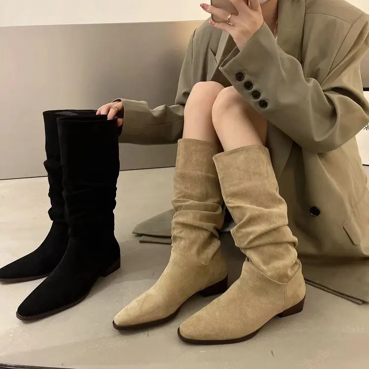 

Sharp pointed pile boots look slimmer than the knee long boots for women 2025 autumn and winter new retro suede western boots