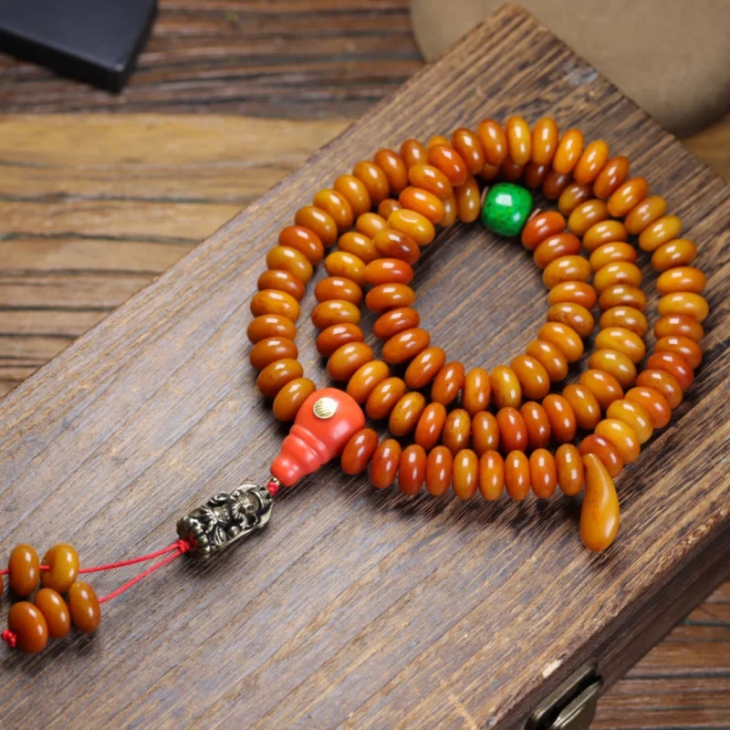 

Tibetan abacus neck hanging bracelet pulp jadified bone Buddha beads imitation Momo three-WA