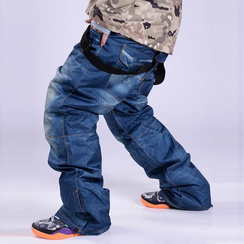 

New style denim ski pants suspenders denim ski pants men's skating snowboard waterproof, windproof and warm ski pants