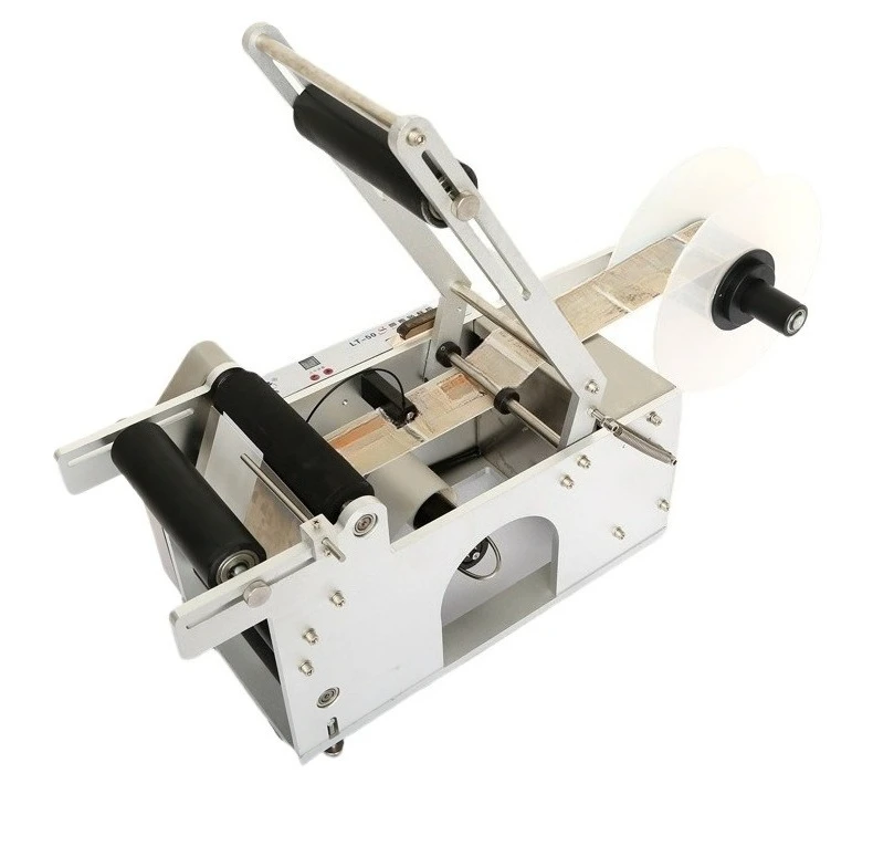 Automatic self-adhesive small flat hand-held semi-automatic round bottle labeling machine Manual labeling machine