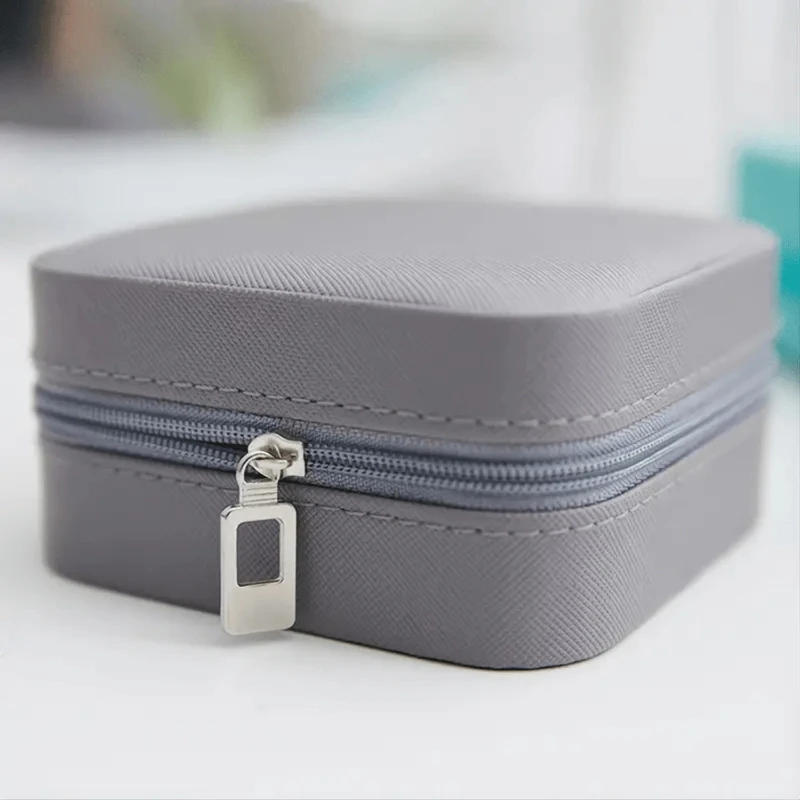 1pcs Portable Jewelry Storage Box - Keep Your Jewelry Safe and Organized with this 1pc Box. Ideal for Travel or Home Use.