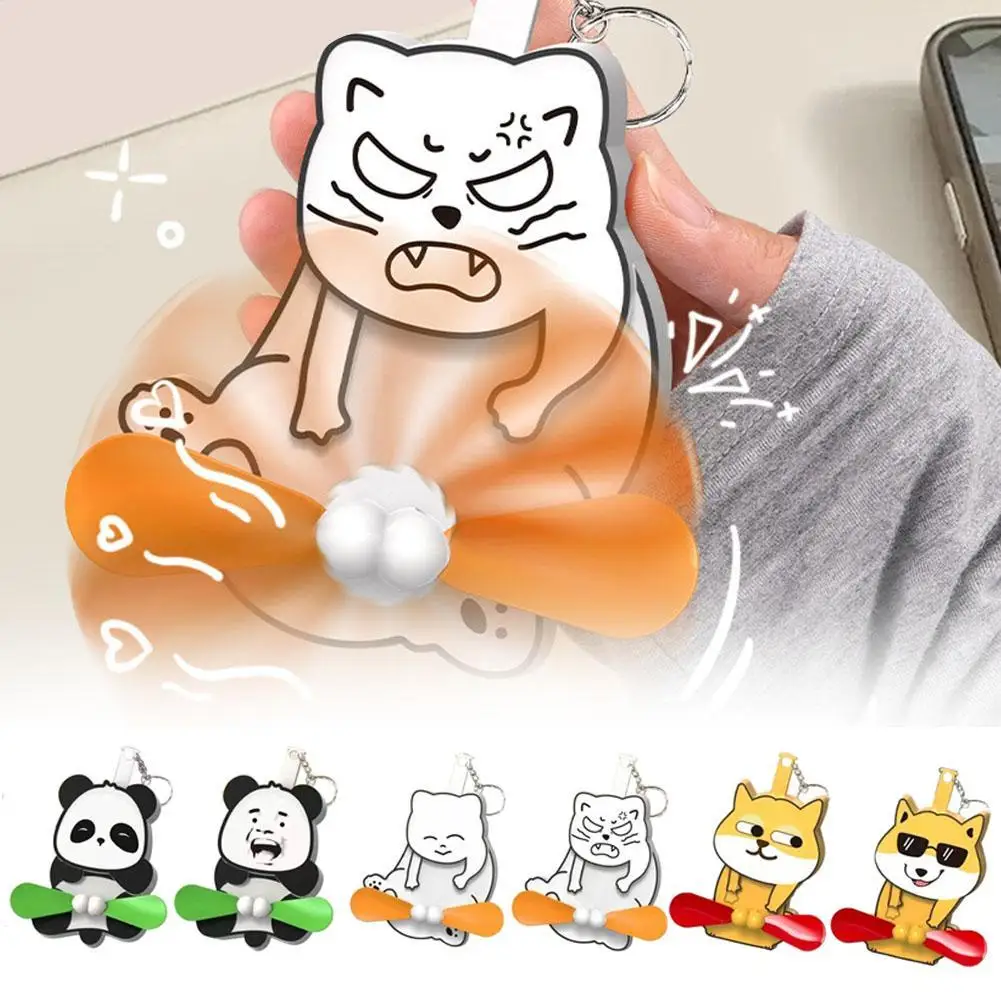 

Novelty Creative Play Egg Cat Keychain Mini Hand-cranked Egg Fan Bag Accessories Double-leaf Cartoon Keychain For Friends Gift