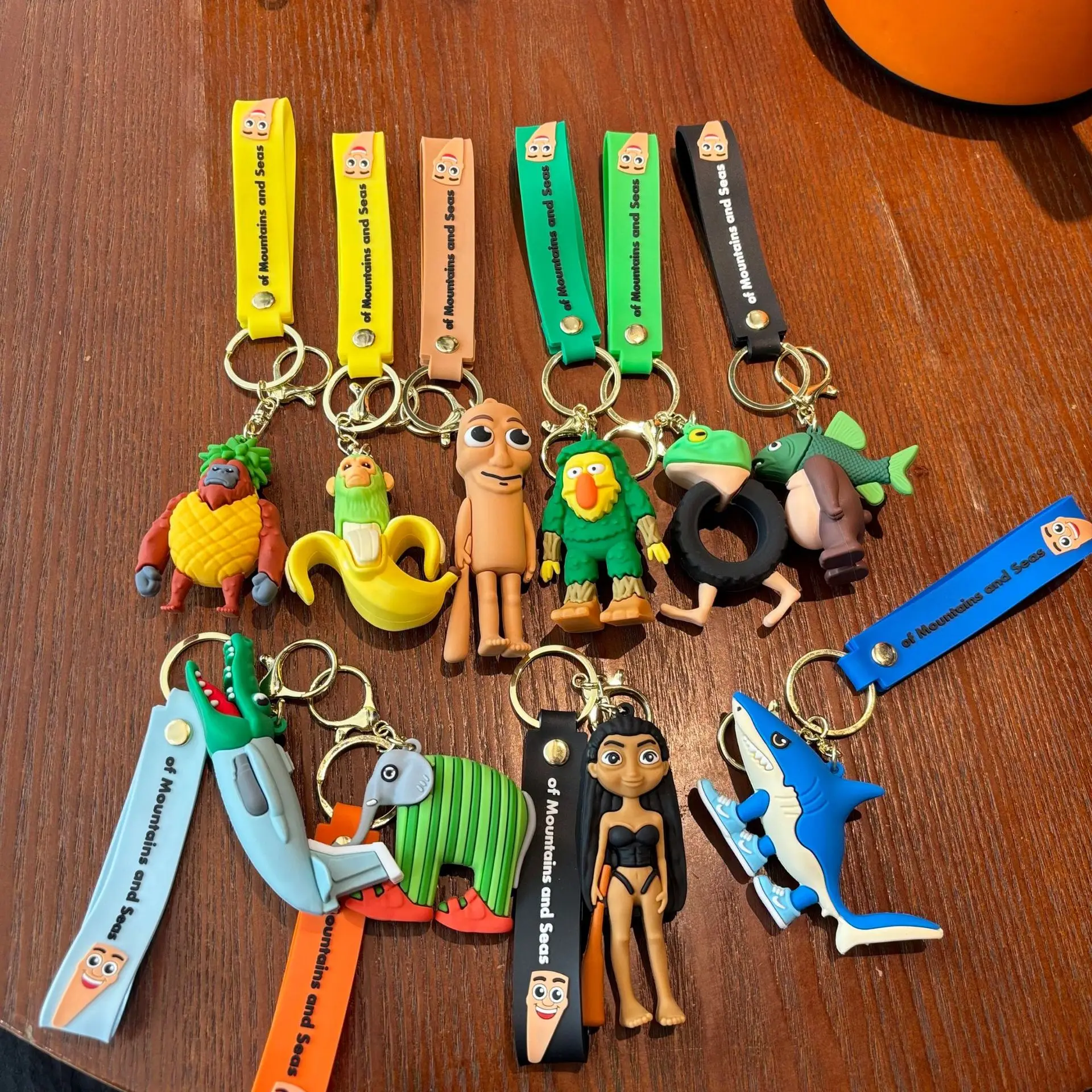 عالية الجودة موانا دمية شان هاي جينغ الشكل سلسلة مفاتيح من السيليكون حقيبة اكسسوارات السيارات مخلب آلة هدية