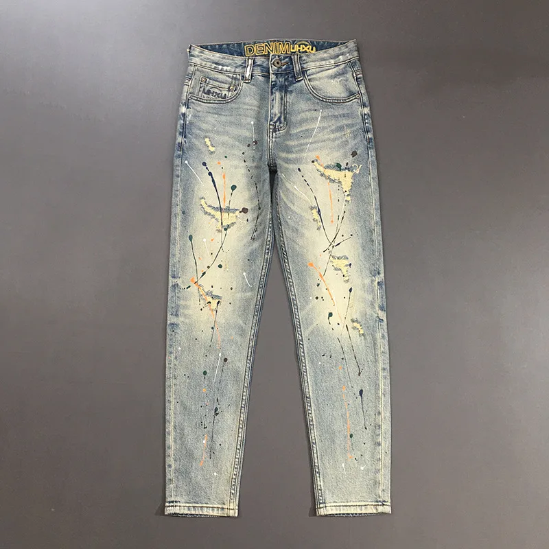 

Heavy duty ripped jeans men's 2025 new style splashed ink design slim fit small straight tube trendy distressed long pants