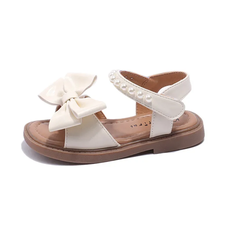 รองเท้าแตะเด็กผู้หญิงและรองเท้าเจ้าหญิงเด็ก 2025 ฤดูร้อนมาใหม่ล่าสุดสําหรับสาวนักเรียน Rhinestone Bow Performance รองเท้า
