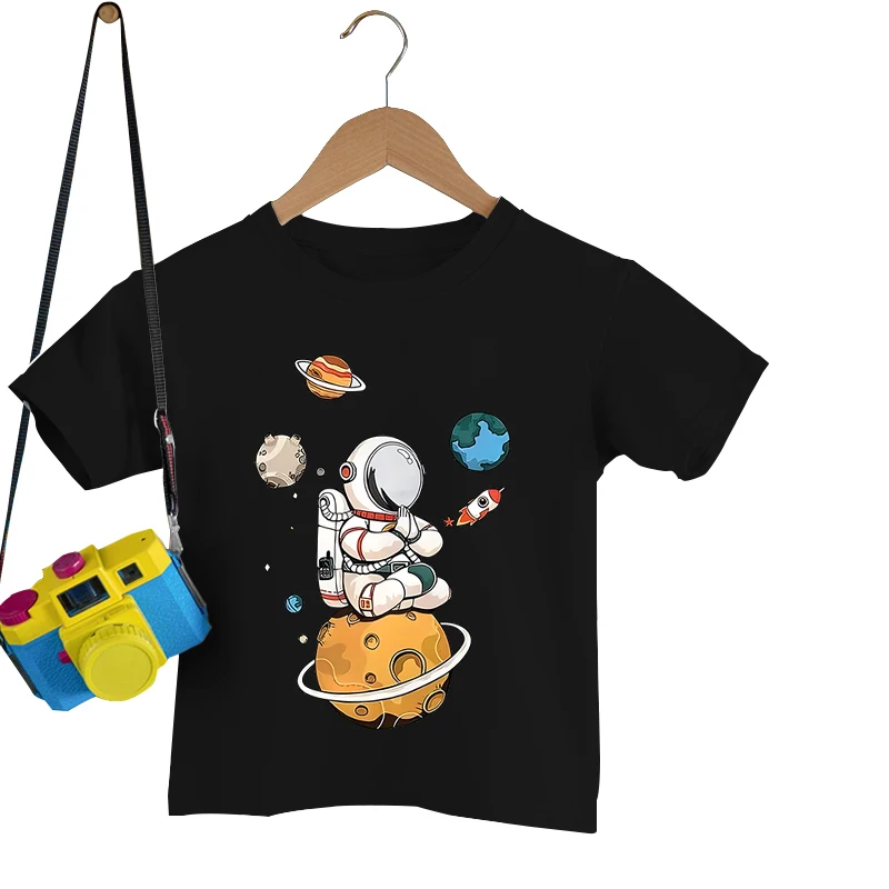 

Funny Cartoon Astronaut Planet Print T-shirts Summer Casual T-shirts Short Sleeves Round Neck Children Girls Boys T-shirts