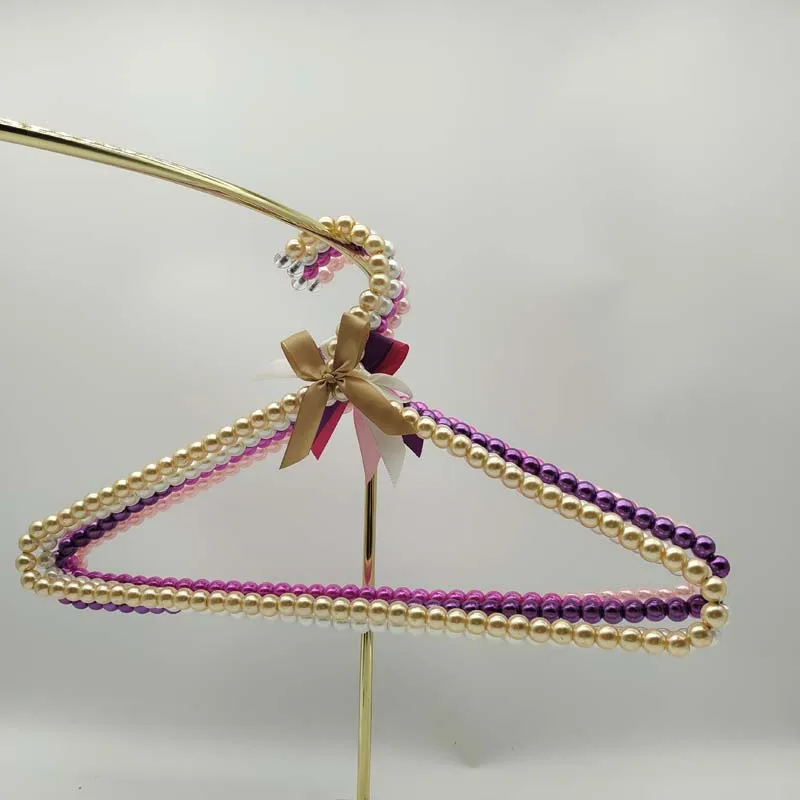 

1/2 Pieces Mini Small Pearl Pet Dog Clothes Hangers Metal Clothet Rack with Ribbon Standard for Kids Baby Children Cat Clothes