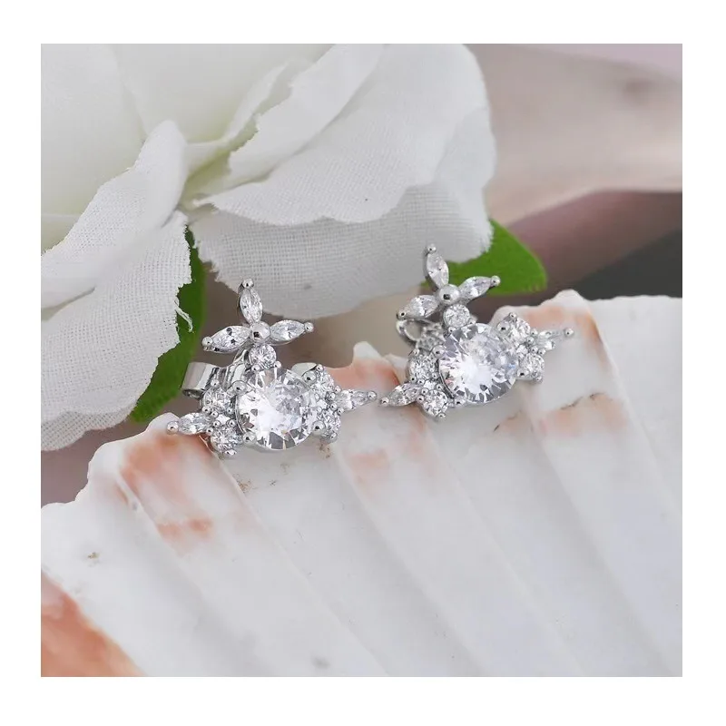 

Horse Eye Zircon Cross Flower Saturn Stud Earrings, High-class Sense, Sweet Wind Temperament Necklace, Collarbone Chain, Female.
