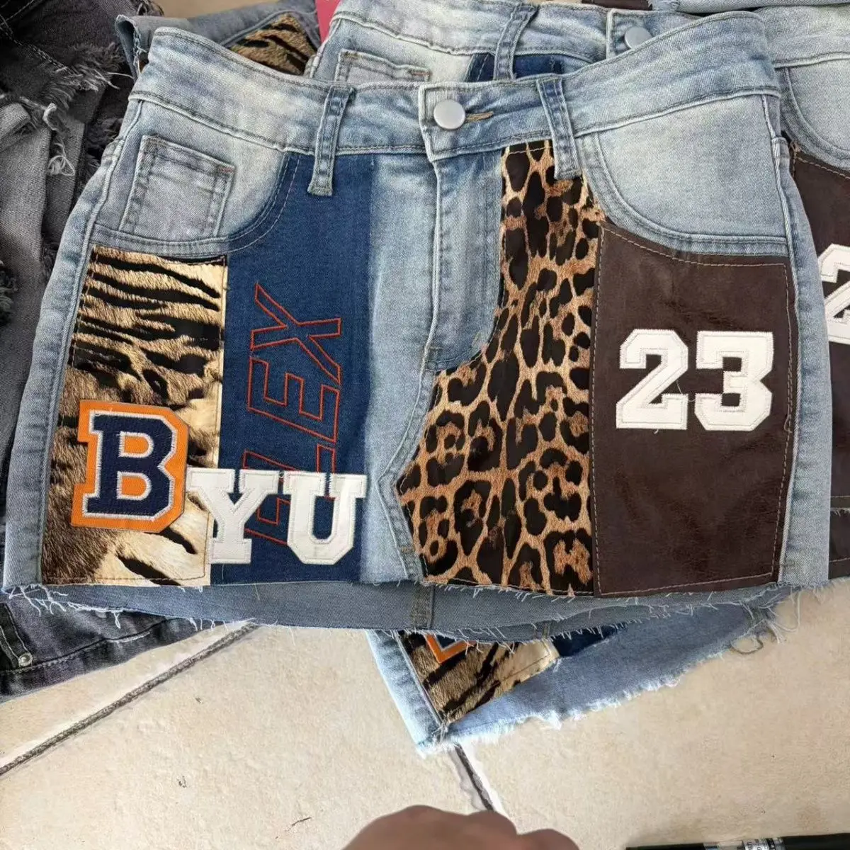 Spicy girl y2k millennium nightclub denim mini shorts skirt womens leopard print patchwork leather 23 skirt motorcycle shorts