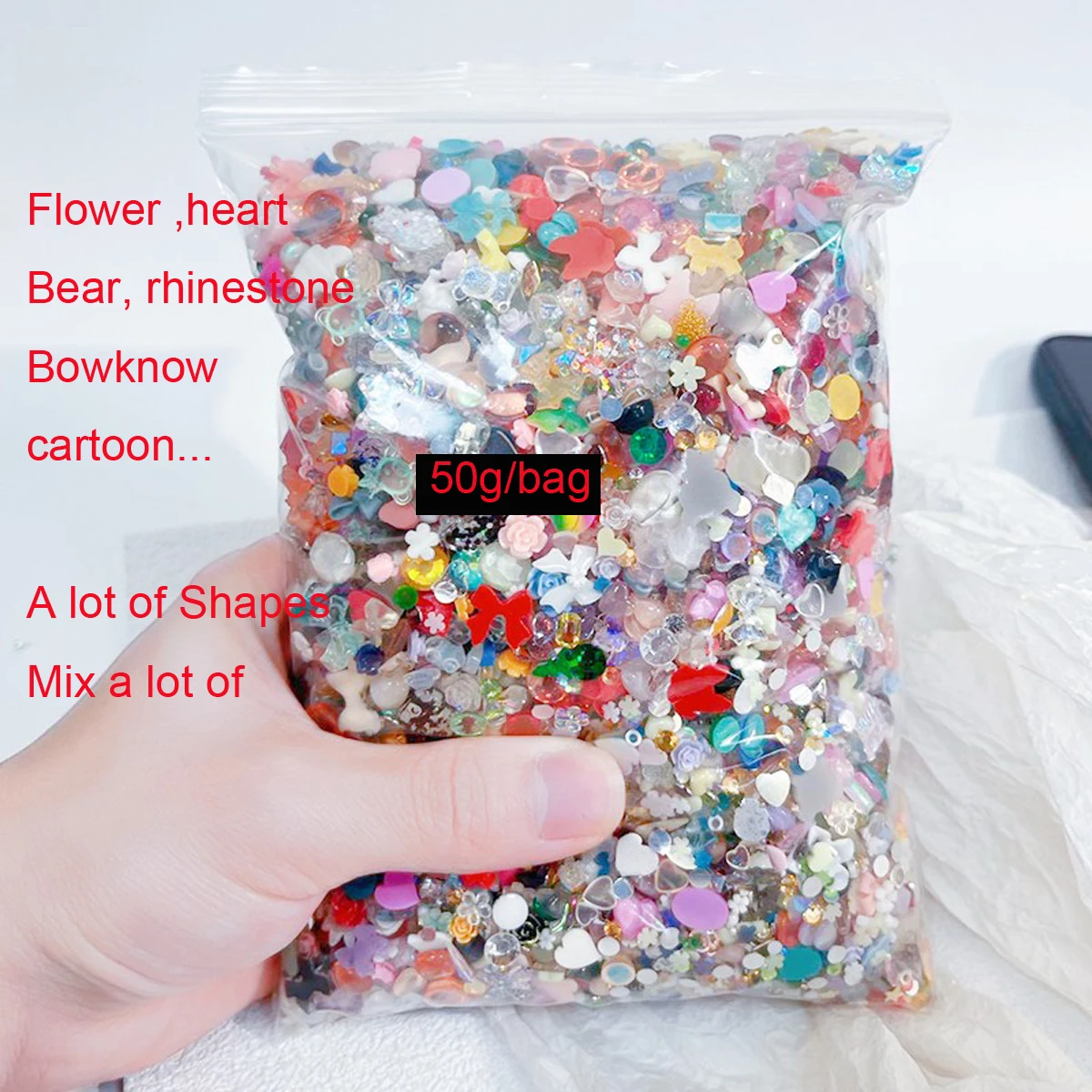 Arco misto e flores Nail Art Charms, resina 3D Aurora Ribbon, Bowknot Rhinestone, coreano Manicure Decoração, 50g por saco, 500-600pcs