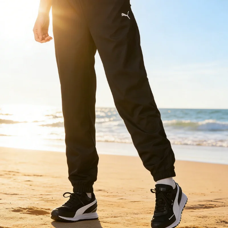 Puma Women's New Quick Drying Woven Sports Pants Running Fitness Night Running Pants Black Loose Comfortable Casual Pants 588952