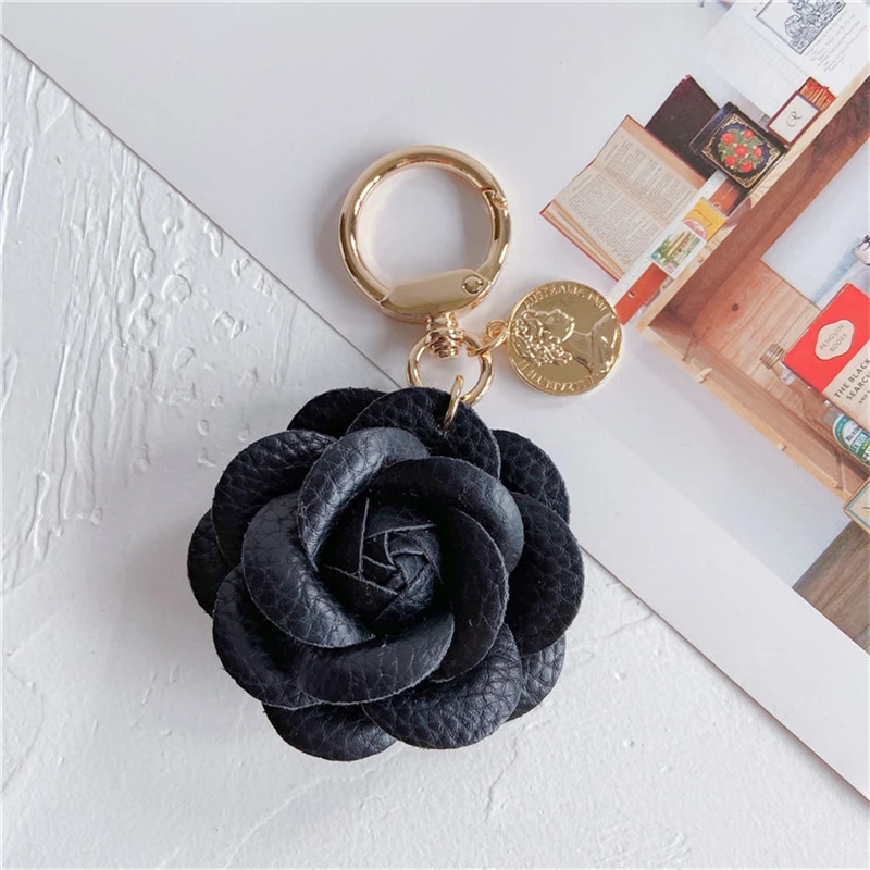 Luxury Black White Camellia Genuine Leather Flower Keychain Letter Umbrella Pendant Car Key Chain Ring Pendant For Bag Accessory