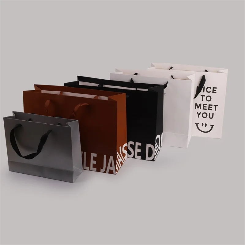 Custom..pieces.Luxury Kraft Paper Bags with Ribbon Handle Custom Printed Luxury Packaging Clothing Gifts Cheap Retail fro