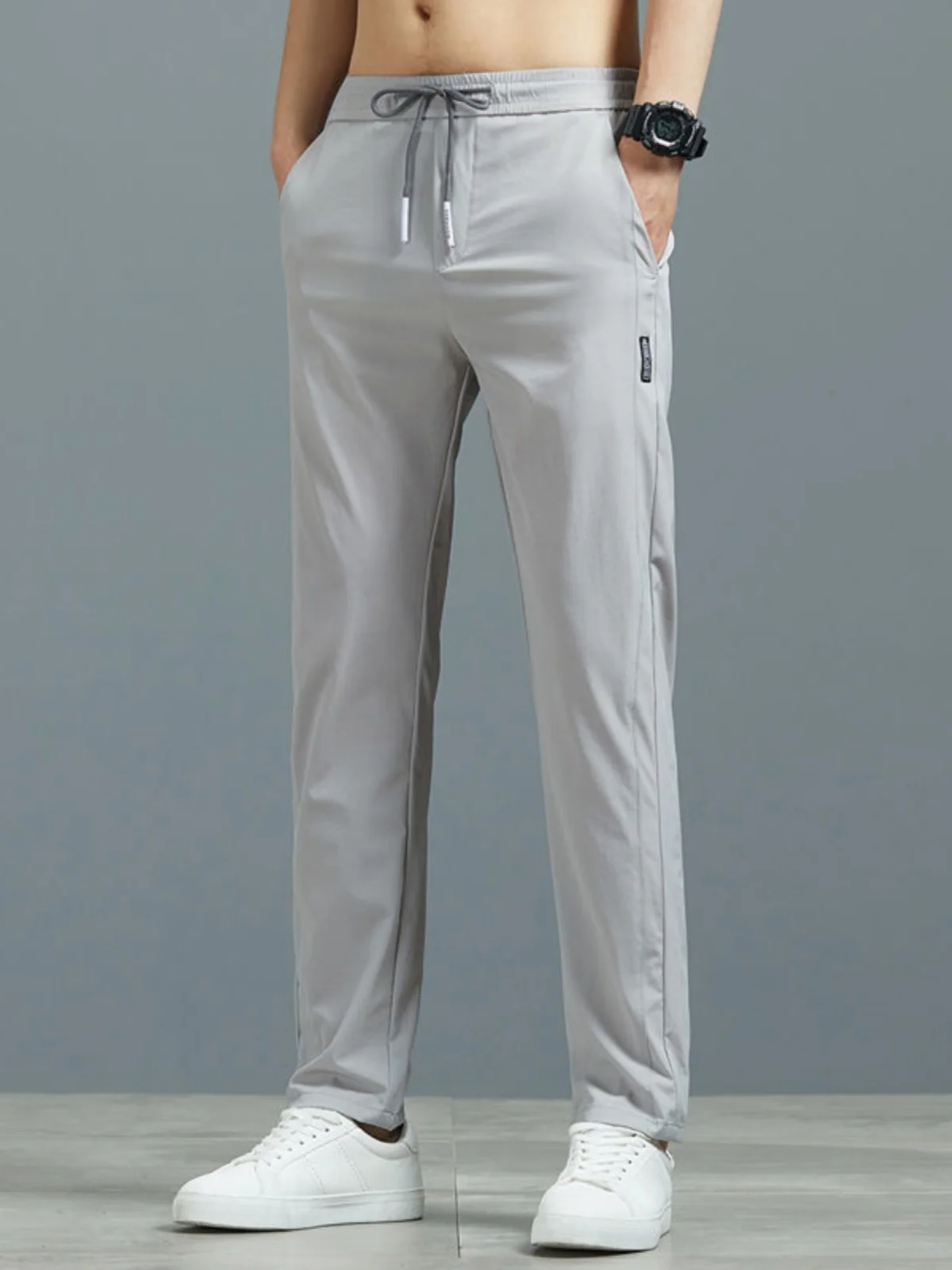 กางเกงลำลองผ้าไหมน้ำแข็งสำหรับผู้ชายฤดูร้อนบางสวมใส่ทนสปอร์กันฝุ่นหลวมกางเกงขายาวบลาเอวต่ำแนวโน้มเยาวชน